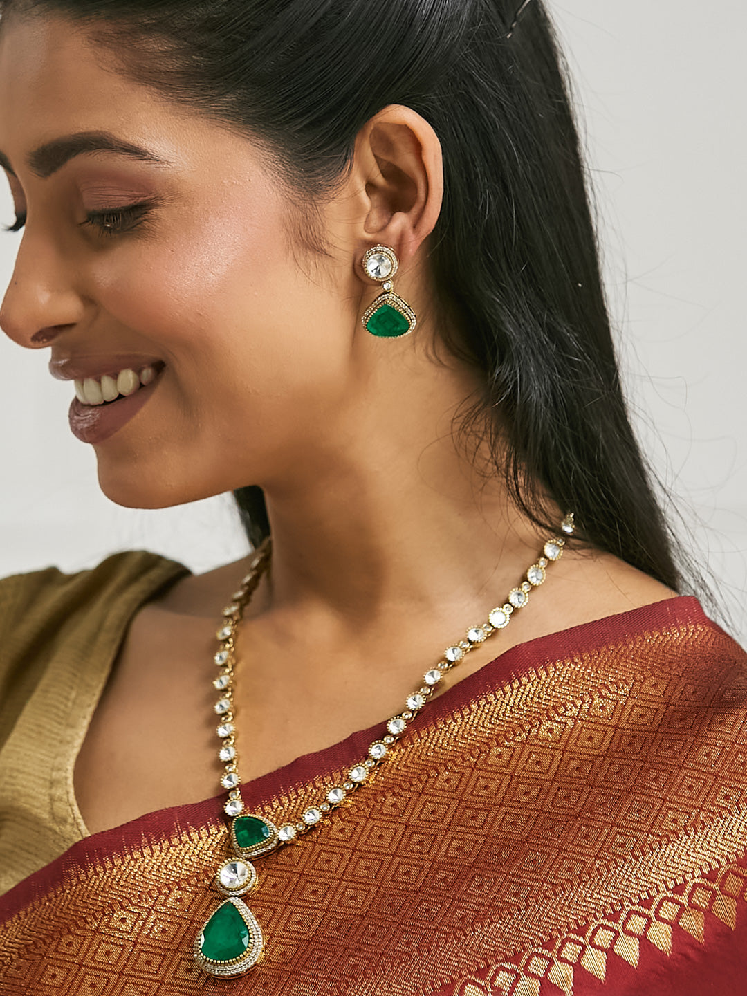 22K Gold-Plated Emerald Stone Centric Kundan Stone Studded Elegant Necklace Set