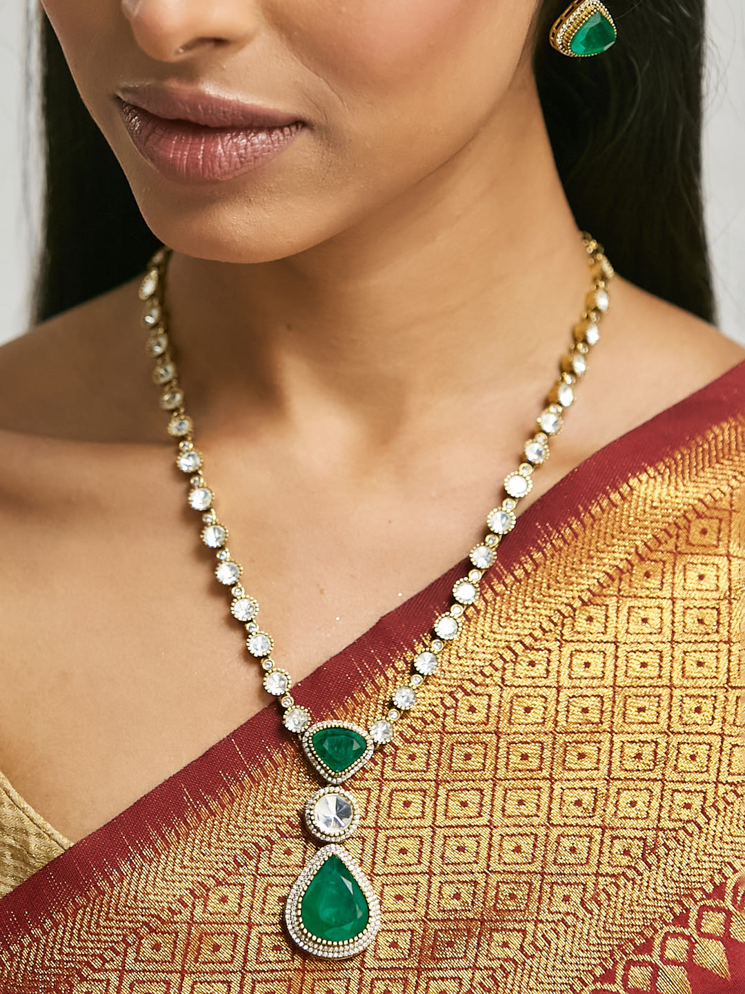 22K Gold-Plated Emerald Stone Centric Kundan Stone Studded Elegant Necklace Set